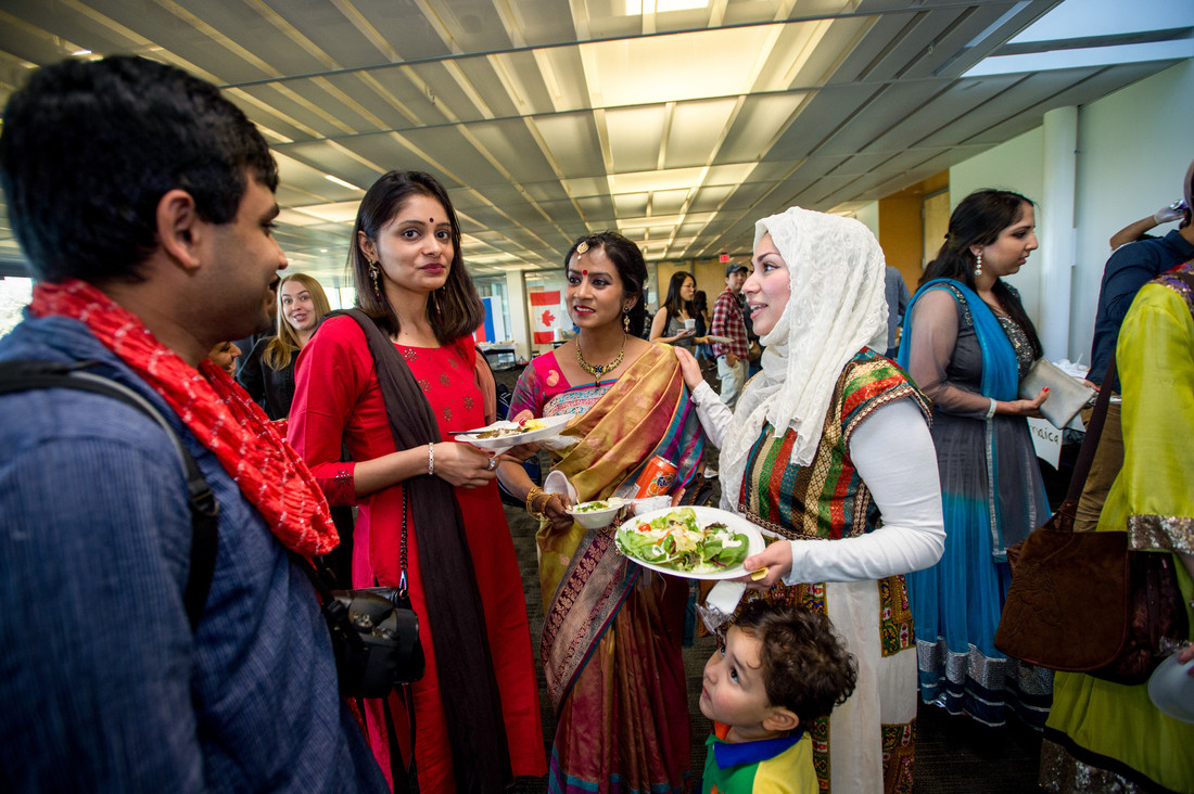 international scholars enjoying food
