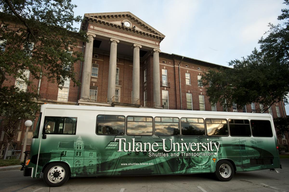 Tulane Shuttle Bus in front of building